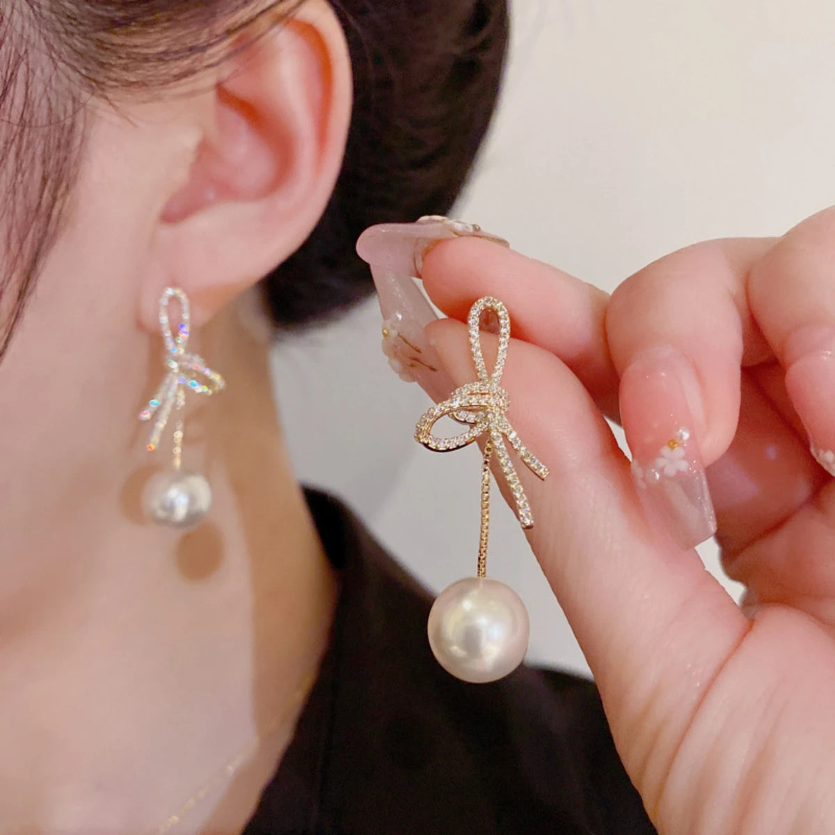 2 Women's Silver Needle Bow Studded With Diamond Pearl Earrings,
