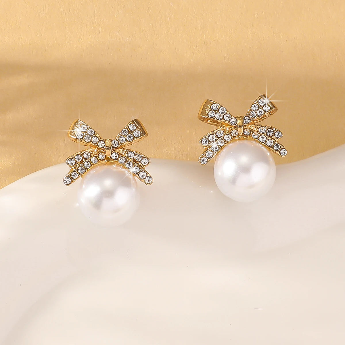 2 Women's Silver Needle Bow Studded With Diamond Pearl Earrings,